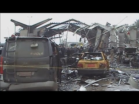 The devastation left after a suicide bomber kills 32 people in Iraq