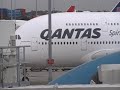 TRAVELERO BOARDS AIRBUS 380-800QANTAS THE BIGGEST AND THE NEWEST.wmv