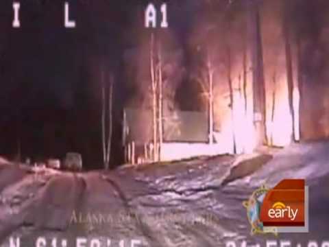 Watch 'Dog leads police to burning home'