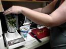 Making a veggie shake for our dogs