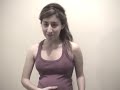 a girl singing to her baby