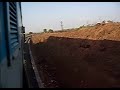 2052 Janshatabdi going arond the bend into Ratnagiri