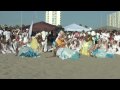viver brasil dancing the movement of yemanja - goddess of the sea, orixa of sea water, guardian of fishermen. the dance is fluid and cooling, like water. notice the crowd around the dancers shout out yemanja's name and salute her by saying 