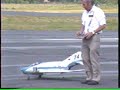 Two giant RC models crash on asphalt, 1990