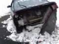 Car stuck in SNOW get TOTALED while being Pulled out