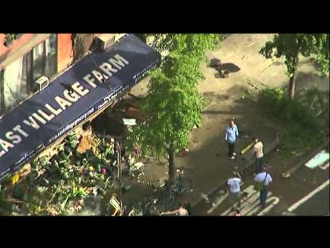 Raw: Car Jumps Curb in NYC, Injures 8