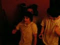 Dancing in a room.