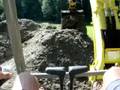 Yanmar VIO55 Excavator digging sand out of a pond