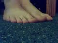 bare feet rubbing hotel carpet