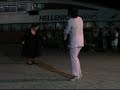 2005 on the island of alonissos in the northern aegean. the local band sometimes plays slightly out of tune but it only adds to the atmosphere. 

the names of people dancing are:
-
-
-
alekos borat zazopoulos  giannis fyssas  nana mouskouri  
alkinoos ioannidis  giannis karmas  natasa zenetzi  
alkistis protopsalti  giannis mpanios  natassa theodoridou  
anestis mantas  giannis parios  nicos portokaloglou  
angela demitriou  giannis savidakis  nikolas asimos  
angeliki eliadi  giorgos zervakis  nikos iakovidis  
anna vissi  hi 5  nikos karvelas  
antique  haris & panos katsimihas  nikos xylouris  
antonis livieratos  haris alexiou  notis sfakianakis  
antonis remos  jason thanos  paparizou elena  
antonis vardis  kaiti garbi  pashalidis miltos  
apostolos nikolaidis  kaiti livanou  pavlos sidiropoulos  
arvanitaki eleftheria  kalliopi vetta  peggy zina  
athena haikali  katsoulis vangelis  peny xenaki  
bigalis kostas  kostas makedonas  petros imvrios  
christos dantis  labis livieratos  pix-lax  
christos kiriazis  lefteris pantazis  ploutarhos giannis  
demis roussos  mando  sakis rouvas  
despina vandi  manolis famellos  stelios kazantzidis  
dimitra galani  manos hatzidakis  stella georgiadou  
dimitris panagopoulos  marcos  triantafillos  
dionisis shinas  margarita zorbala  vasilis karas  
dytikes synoikies  maria farantouri  vasilis papakonstantinou  
elena paparizou  maria louiza vassilopoulou  vicky leandros  
eleni peta  maria polykandrioti  victoria chalkiti  
eleni tsaligopoulou  maria stavropoulos  xristina delli  
evridiki  melina kana  yanni  
elli kokkinou mariada petridi yiannis fyssas 
fatme - portokaloglou  melina tanagri  yannis k. ioannou 
george alkaios  michalis hadjigiannis  yiannis karmas 
george dalaras  michalis rakintzis  yiannis kotsiras  
george mazonakis  mitropanos dimitris  yiannis mpanios 
 george scordilis    yiannis parios 
 giorgos tsalikis   yiannis savidakis

athens skopelos skiathos volos thessaloniki crete rhodos kos corfu levkas kithera peloponessos santorini lesbos