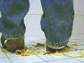 Clogs crushing a pear Clogs crushing a pear