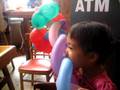 Kristin Eating Balloon
