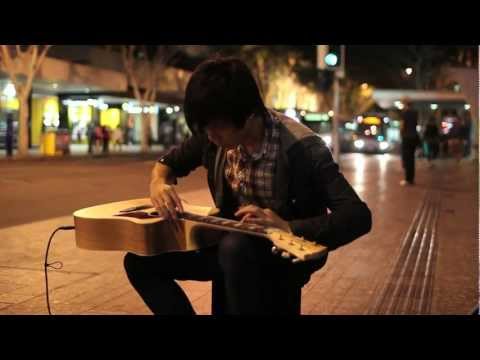 Musician - I had never seen or heard anything like this before. An incredible musician playing his guitar on the corner of Adelaide and Albert Street, Brisbane. When I...