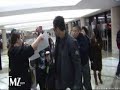 disclaimer: i don't own clips in this video. megan fox & brian austin green arrived at lax aiport in la with some crazy fan & paparazzi
