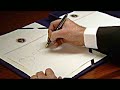George signs a Treaty