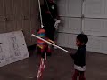 kids hitting a pinata