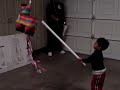 kids hitting a pinata
