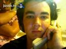 Kevin On the Phone, Joe standing in the background