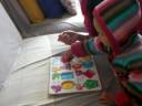 Baby Natalie solves a puzzle