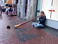 Street Didge player in Amsterdam Street Didge player in Amsterdam