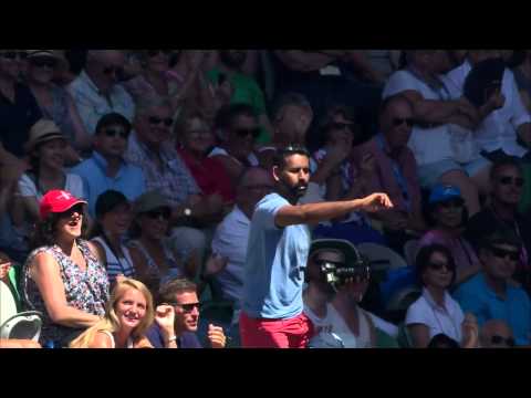 crowd - Rod Laver Arena fan takes a classic catch in the crowd of the 2015 Australian Open.