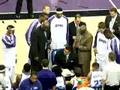 Reggie Theus drawing something up.