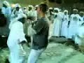 Foreigner in the middle of traditional Arab dance