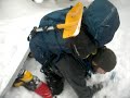 heavy pack and long ski out causes crash on steep switchback.
