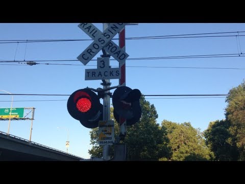 railroad crossing - I was in the downtown area again so I wanted to catch a light rail train or an Union Pacific Freight train here. This is the SACRT light rail Blue line next to the Union Pacific & BNSF Sacramento...