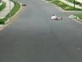 Girl on a skateboard face plants hard