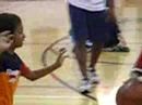 Soorya learning how to defend from Coach Tony at the YMCA Basketball camp!
