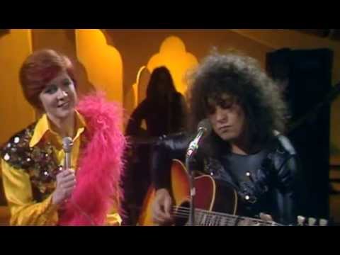 glam - Profiling the leading men of the glam rock era, Lisa Tarbuck guides us through the glittering careers of Marc Bolan, David Bowie, Noddy Holder, Brian Ferry, ...