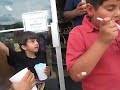 Noor, Hasham and Taimour in Drumheller with Dinosaur