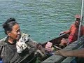 Old Moken ladies fishing squid in mergui archipelago