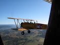 Boeing Stearman flying in formation with a Tiger Moth