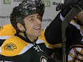 Milan Lucic hits Mike Van Ryn through the Glass