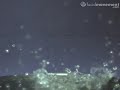 Cold blast of air in water in slow motion.