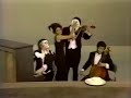 Maria sings about subtraction with whipped cream pies.