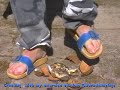 Crushing a coconut with my exercise sandals