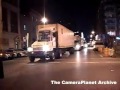 wtc site, earth movers, semi trucks, ambulances, police