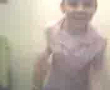 girl killing chicken