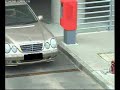 woman trying to drive out of the parking..