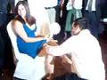 Josh putting the garter on
