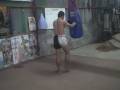 sangsakda, pipat kritep ( ex-lumpinee champion, contender asia trainer ) doing bag work..