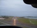 Pilot Stuart Clare comes in for a perfect landing after our island tour