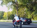 man bugging out on his bike man bugging out on his bike