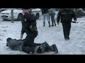 I'm not really sure what made the cops chase this guy down... I heard it's because he threw a snowball at a cop. Overreaction? You decide.