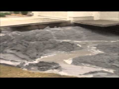 Raw: Sinkhole Swallows Part of Fla. Yard