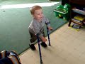 Matteus walking with forearm crutches