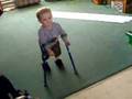 Matteus walking with forearm crutches